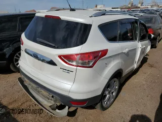 2016 Ford Escape Titanium with VIN 1FMCU9J91GUA11090, listed as a Copart auction lot 54231675 with 135,735 mi miles and Salvage Title. Bid and sale history available at DreamBid. Image 3.