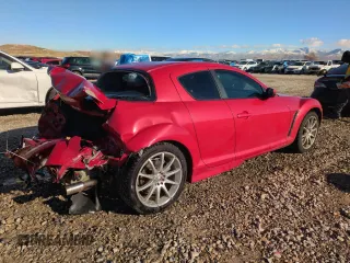 2004 Mazda RX-8 with VIN JM1FE173040121702, listed as a Copart auction lot 87037064 with 51,964 mi miles and Salvage Title. Bid and sale history available at carsss.com. Image 3.