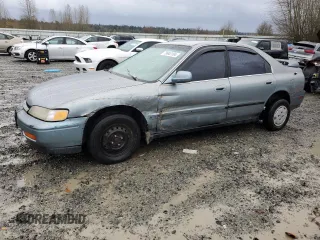 1995 Honda Accord LX with VIN JHMCD5632SC061723, listed as a Copart auction lot 79943104 with 251,242 mi miles and Salvage Title. Bid and sale history available at carsss.com. Image 1.