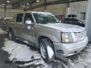 2004 Cadillac Escalade EXT z VIN 3GYEK62N34G324955, wystawiony jako Copart lot #87479764 z przebiegiem 218 127 mil mil oraz Szkody całkowita. Historia ofert i sprzedaży dostępna na DreamBid. Obrazek 4.