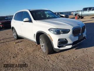 2019 BMW X5 xDrive40i with VIN 5UXCR6C50KLL09819, listed as a IAAI auction lot 41807856 with 92,736 mi miles. Bid and sale history available at carsss.com. Image 1.