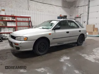 1999 Subaru Impreza L with VIN JF1GF4357XH811307, listed as a IAAI auction lot 41505426 with 195,693 mi miles and . Bid and sale history available at DreamBid. Image 2.