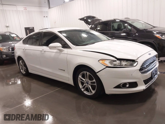 2015 Ford Fusion SE Hybrid with VIN 3FA6P0LU8FR215788, listed as a IAAI auction lot 42038194 with 136,949 mi miles and . Bid and sale history available at DreamBid. Image 13.