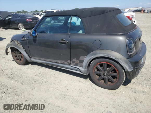 2011 MINI Convertible S с VIN WMWZP3C59BT249133, выставлен на аукционе Copart как лот 56402615 с пробегом 103 809 миль миль и Списание • Salvage title. История ставок и продаж доступна на DreamBid. Изображение 2.
