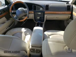 2002 Lincoln Continental with VIN 1LNHM97V62Y643532, listed as a Copart auction lot 76015984 with 154,374 mi miles and Salvage Title. Bid and sale history available at carsss.com. Image 8.