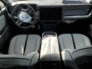 2024 Rivian R1T Adventure with VIN 7FCTGBAA9RN031298, listed as a Copart auction lot 71777774 with 0 mi miles and Salvage Title. Bid and sale history available at carsss.com. Image 8.