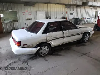 1991 Toyota Camry z VIN 4T1VV21E8MU050409, wystawiony jako Copart lot #61379824 z przebiegiem 100 949 mil mil oraz Nie do naprawy • Non repairable. Historia ofert i sprzedaży dostępna na DreamBid. Obrazek 3.