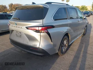 2021 Toyota Sienna XLE with VIN 5TDYRKEC2MS074448, listed as a IAAI auction lot 41946030 with 122,509 mi miles and . Bid and sale history available at DreamBid. Image 4.