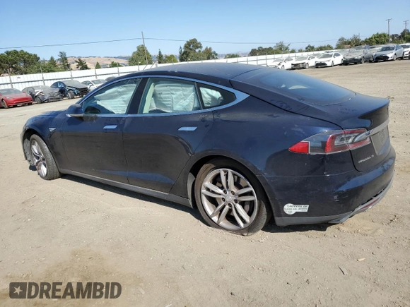 2013 Tesla Model S with VIN 5YJSA1AC9DFP10400, listed as a Copart auction lot 59047985 with 165,166 mi miles and Salvage title. Bid and sale history available at DreamBid. Image 2.