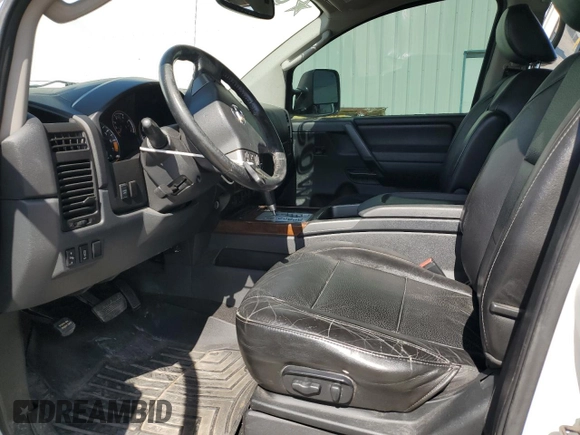 2011 Nissan Titan Pro-4X with VIN 1N6BA0EC2BN317628, listed as a Copart auction lot 52367505 with 178,601 mi miles and Salvage title. Bid and sale history available at DreamBid. Image 7.