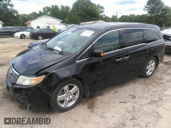 2012 Honda Odyssey Touring with VIN 5FNRL5H97CB066596, listed as a IAAI auction lot 42472935 with 217,182 mi miles and . Bid and sale history available at DreamBid. Image 17.