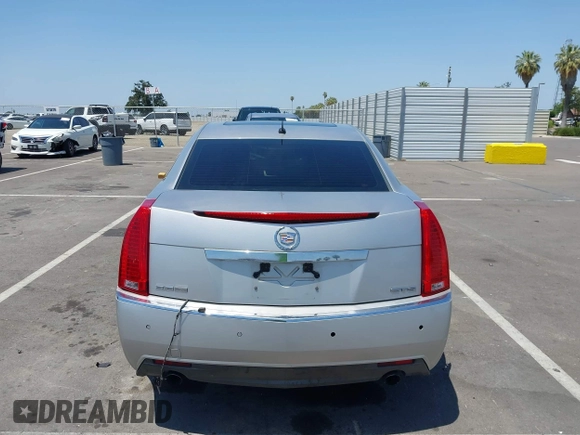 2008 Cadillac CTS RWD z VIN 1G6DV57V880153063, wystawiony jako IAAI lot #42440277 z przebiegiem 158 312 mil mil oraz . Historia ofert i sprzedaży dostępna na DreamBid. Obrazek 16.