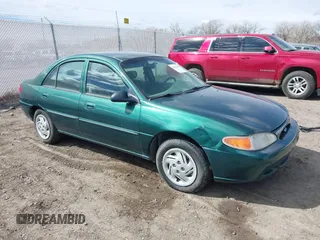 1999 Ford Escort SE z VIN 1FAFP13P1XW232074, wystawiony jako IAAI lot #41841145 z przebiegiem 136 627 mil mil oraz . Historia ofert i sprzedaży dostępna na DreamBid. Obrazek 1.