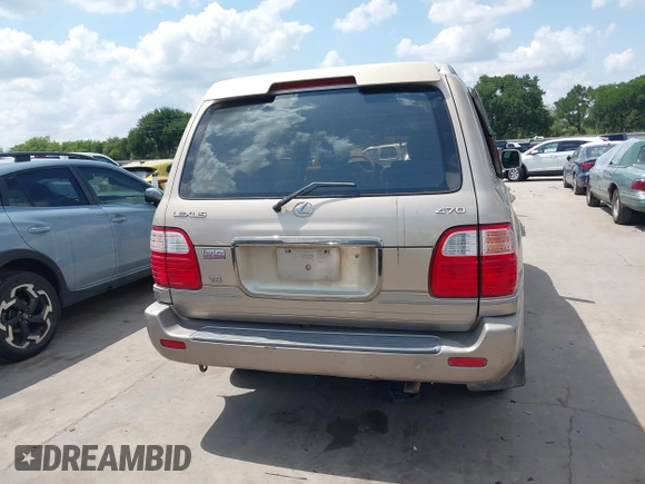 2001 Lexus LX 470 with VIN JTJHT00W713511796, listed as a IAAI auction lot 42222574 with 297,427 mi miles and . Bid and sale history available at carsss.com. Image 16.