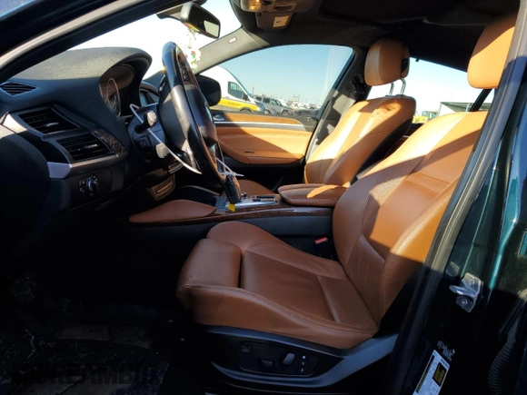 2013 BMW X6 xDrive35i z VIN 5UXFG2C5XDL786031, wystawiony jako Copart lot #42719395 z przebiegiem 95 920 mil mil oraz Szkoda całkowita • Salvage title. Historia ofert i sprzedaży dostępna na DreamBid. Obrazek 7.