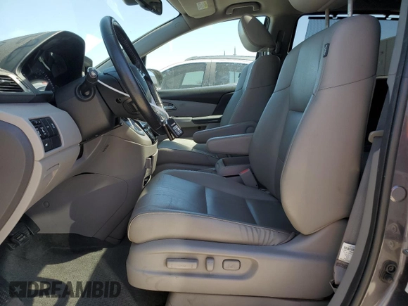 2016 Honda Odyssey EX-L with VIN 5FNRL5H6XGB100929, listed as a Copart auction lot 48889205 with 148,766 mi miles and Salvage Title. Bid and sale history available at DreamBid. Image 7.