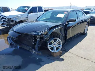 2022 Dodge Charger SXT with VIN 2C3CDXBG9NH201715, listed as a IAAI auction lot 41583612 with 51,426 mi miles. Bid and sale history available at carsss.com. Image 2.