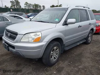 2004 Honda Pilot EX with VIN 2HKYF18494H525047, listed as a IAAI auction lot 41927610 with 999,999 mi miles. Bid and sale history available at carsss.com. Image 2.