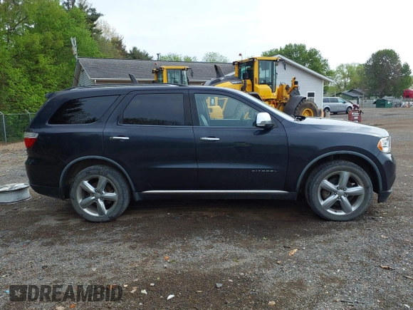 2012 Dodge Durango Citadel with VIN 1C4SDJET1CC205092, listed as a IAAI auction lot 42164281 with 276,322 mi miles. Bid and sale history available at carsss.com. Image 14.
