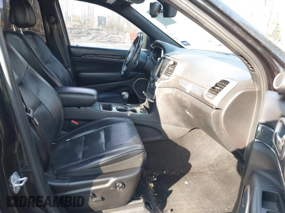 2015 Jeep Grand Cherokee Overland with VIN 1C4RJECGXFC957530, listed as a IAAI auction lot 41633522 with 168,258 mi miles and . Bid and sale history available at DreamBid. Image 5.