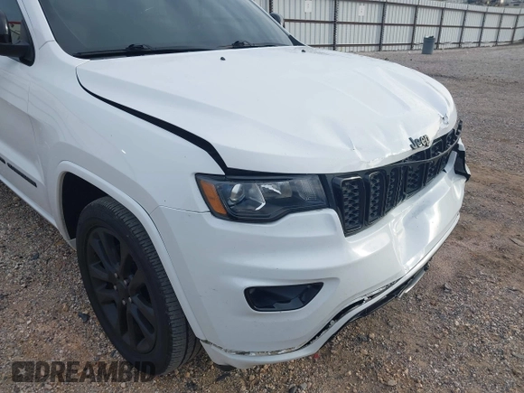 2019 Jeep Grand Cherokee Altitude with VIN 1C4RJEAG3KC572713, listed as a IAAI auction lot 41348420 with 133,735 mi miles and . Bid and sale history available at DreamBid. Image 19.