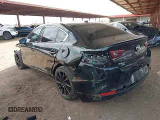 2023 Mazda 3 Premium Plus with VIN 3MZBPBEY6PM350056, listed as a IAAI auction lot 41940111 with 27,091 mi miles and . Bid and sale history available at DreamBid. Image 3.