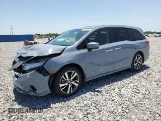 2024 Honda Odyssey Touring z VIN 5FNRL6H82RB018347, wystawiony jako Copart lot #57490295 z przebiegiem Nie podano mil oraz Szkoda całkowita • Salvage title. Historia ofert i sprzedaży dostępna na DreamBid. Obrazek 1.