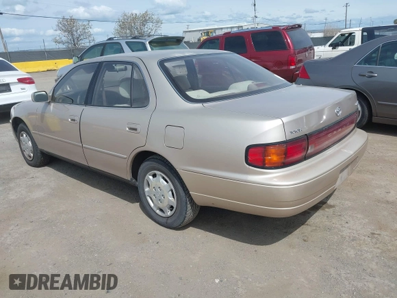 1993 Toyota Camry LE with VIN JT2SK12E6P0122365, listed as a IAAI auction lot 41977260 with 162,971 mi miles. Bid and sale history available at carsss.com. Image 3.