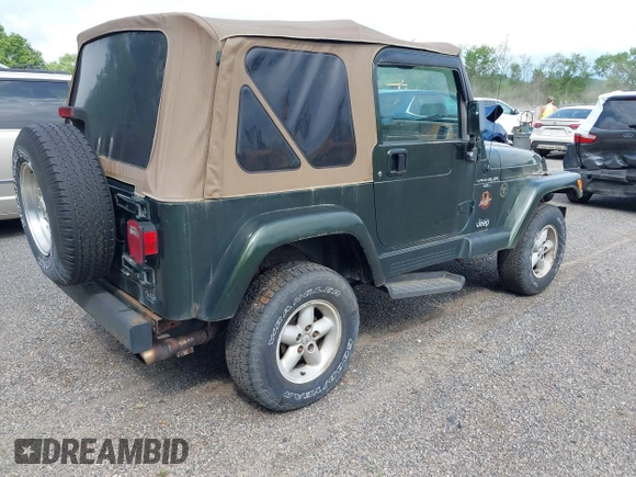 1998 Jeep Wrangler Sahara z VIN 1J4FY49SXWP716218, wystawiony jako IAAI lot #42354433 z przebiegiem 234 378 mil mil oraz . Historia ofert i sprzedaży dostępna na DreamBid. Obrazek 4.