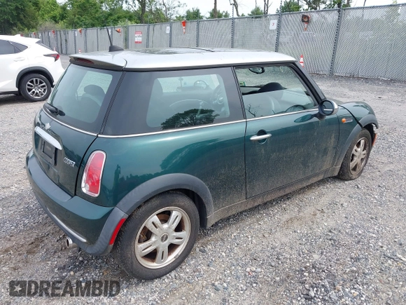 2006 MINI Hardtop with VIN WMWRC33566TK64108, listed as a IAAI auction lot 42353050 with 95,223 mi miles and . Bid and sale history available at DreamBid. Image 4.