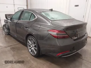 2022 Genesis G70 2.0T with VIN KMTG34TA3NU099724, listed as a IAAI auction lot 41384087 with 46,041 mi miles. Bid and sale history available at carsss.com. Image 3.