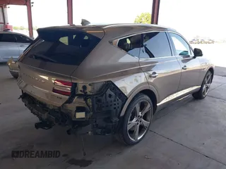 2021 Genesis GV80 with VIN KMUHCESC5MU031187, listed as a IAAI auction lot 42003804 with 65,909 mi miles and . Bid and sale history available at DreamBid. Image 4.