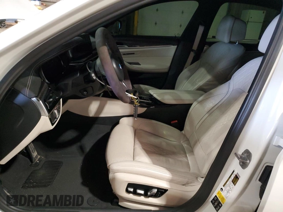 2018 BMW 5 Series M550i xDrive with VIN WBAJB9C5XJB035514, listed as a Copart auction lot 50045425 with 76,325 mi miles and Salvage Title. Bid and sale history available at carsss.com. Image 7.