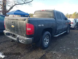 2010 Chevrolet Silverado 1500 LS with VIN 3GCRKREA9AG151200, listed as a IAAI auction lot 41172064 with 113,662 mi miles. Bid and sale history available at carsss.com. Image 4.
