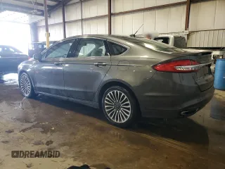 2017 Ford Fusion Titanium z VIN 3FA6P0D93HR303905, wystawiony jako Copart lot #63621745 z przebiegiem 120 249 mil mil oraz Szkoda całkowita • Salvage title. Historia ofert i sprzedaży dostępna na DreamBid. Obrazek 2.