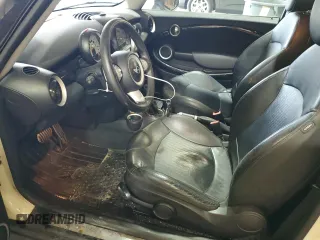 2009 MINI Hardtop S with VIN WMWMF73509TW83066, listed as a Copart auction lot 58603205 with 113,242 mi miles and Salvage title. Bid and sale history available at DreamBid. Image 7.