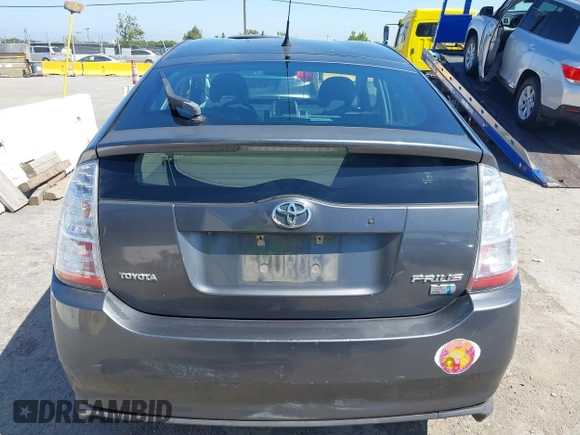 2007 Toyota Prius z VIN JTDKB20UX73217307, wystawiony jako IAAI lot #42225740 z przebiegiem 196 251 mil mil oraz . Historia ofert i sprzedaży dostępna na DreamBid. Obrazek 16.