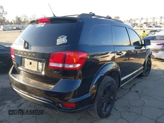 2012 Dodge Journey SXT with VIN 3C4PDCCG7CT364498, listed as a IAAI auction lot 42677342 with Not provided miles and . Bid and sale history available at DreamBid. Image 4.