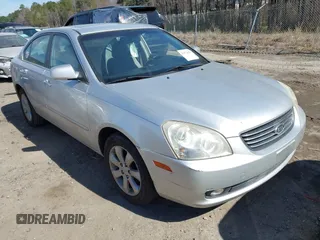 2007 Kia Optima EX with VIN KNAGE124975157963, listed as a IAAI auction lot 41673886 with 128,278 mi miles. Bid and sale history available at carsss.com. Image 1.