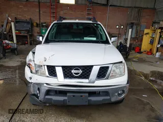 2011 Nissan Frontier Pro-4X with VIN 1N6AD0EV3BC409184, listed as a IAAI auction lot 42122823 with 209,669 mi miles and . Bid and sale history available at DreamBid. Image 12.