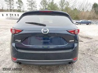2017 Mazda CX-5 Grand Touring with VIN JM3KFBDL9H0180038, listed as a IAAI auction lot 41394047 with 111,581 mi miles. Bid and sale history available at carsss.com. Image 16.