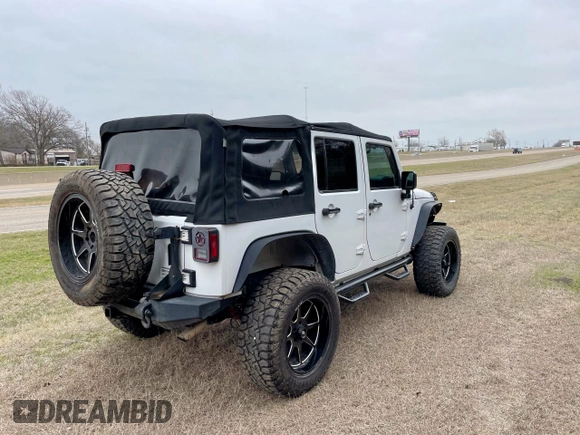 2016 Jeep Wrangler Unlimited Sport with VIN 1C4HJWDG7GL114807, listed as a Copart auction lot 54988515 with 118,651 mi miles and Clean Title. Bid and sale history available at DreamBid. Image 4.