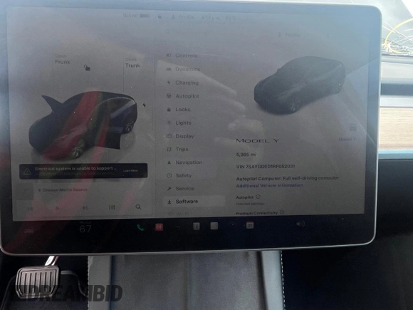 2024 Tesla Model Y with VIN 7SAYGDED1RF052031, listed as a Copart auction lot 48507865 with 5,365 mi miles and Salvage title. Bid and sale history available at DreamBid. Image 9.
