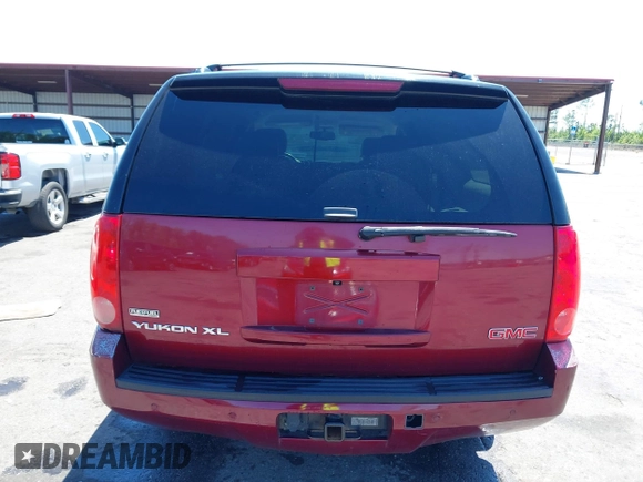 2011 GMC Yukon XL SLT with VIN 1GKS2KE37BR118843, listed as a IAAI auction lot 41983870 with 236,029 mi miles. Bid and sale history available at carsss.com. Image 16.
