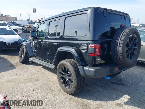 2023 Jeep Wrangler Sahara with VIN 1C4JJXP67PW556933, listed as a IAAI auction lot 41587035 with 20,463 mi miles and . Bid and sale history available at DreamBid. Image 3.