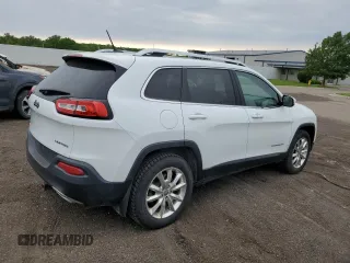 2015 Jeep Cherokee Limited z VIN 1C4PJMDS3FW511528, wystawiony jako Copart lot #58977015 z przebiegiem 167 652 mil mil oraz Czysty tytuł • Clean title. Historia ofert i sprzedaży dostępna na DreamBid. Obrazek 3.