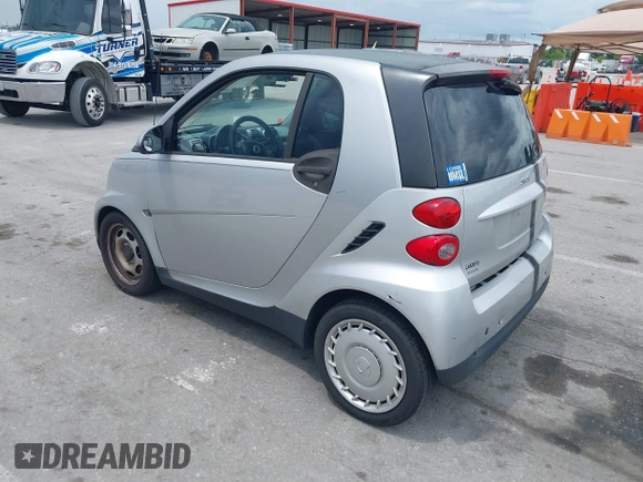 2009 Smart fortwo Pure with VIN WMEEJ31X69K317204, listed as a IAAI auction lot 42779603 with 159,179 mi miles and . Bid and sale history available at DreamBid. Image 3.