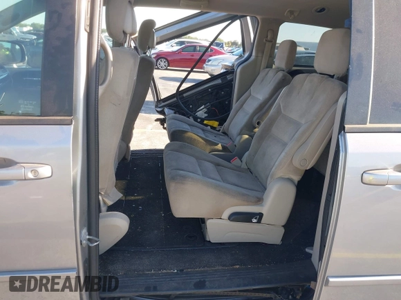 2015 Dodge Grand Caravan SXT with VIN 2C4RDGCG3FR592098, listed as a IAAI auction lot 42038665 with 104,092 mi miles and . Bid and sale history available at DreamBid. Image 8.