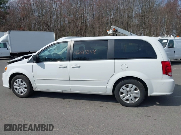 2015 Dodge Grand Caravan SE with VIN 2C4RDGBG6FR613981, listed as a IAAI auction lot 42043348 with 87,615 mi miles and . Bid and sale history available at DreamBid. Image 14.