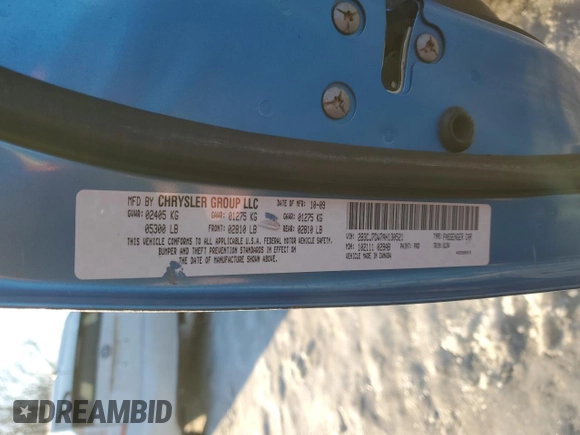 2010 Dodge Challenger SRT-8 with VIN 2B3CJ7DW7AH130521, listed as a Copart auction lot 88990235 with 128,370 mi miles and Salvage title. Bid and sale history available at DreamBid. Image 12.